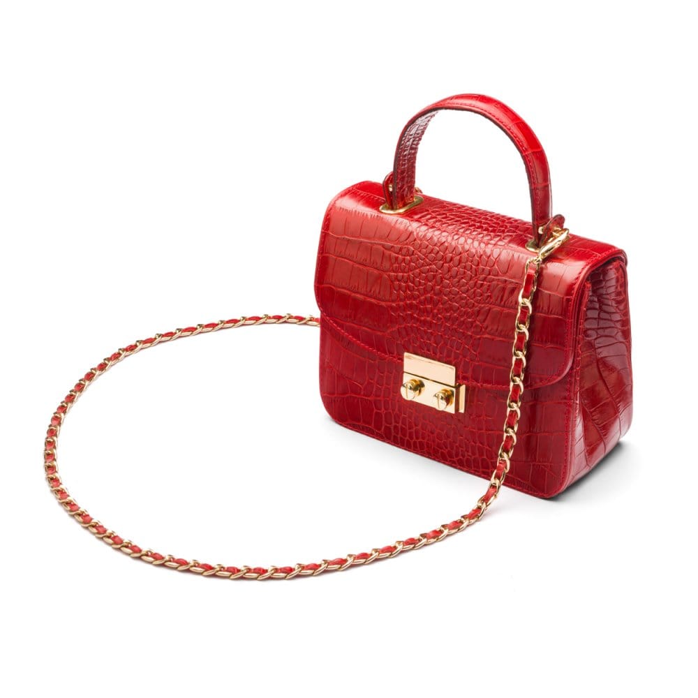 Small leather top handle bag, red croc, side