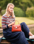 Leather top handle bag, red croc, lifestyle