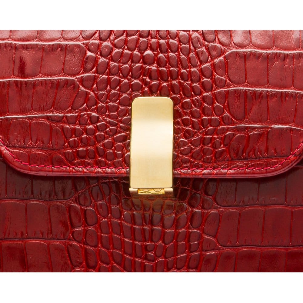 Leather top handle bag, red croc, lock closeup