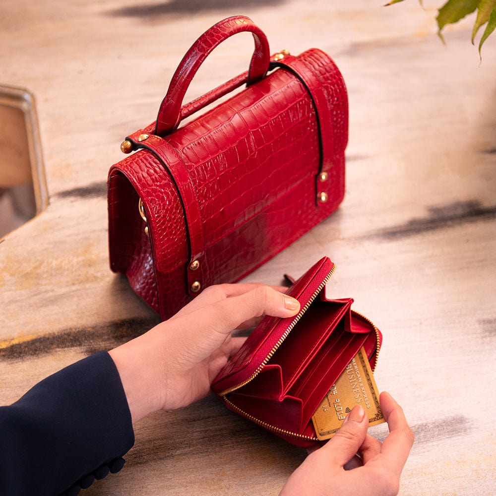 Small leather zip around purse, red croc, lifestyle