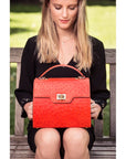 Real ostrich top handle bag, red, lifestyle