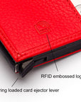 RFID wallet with pop-up credit card case, red, close up view
