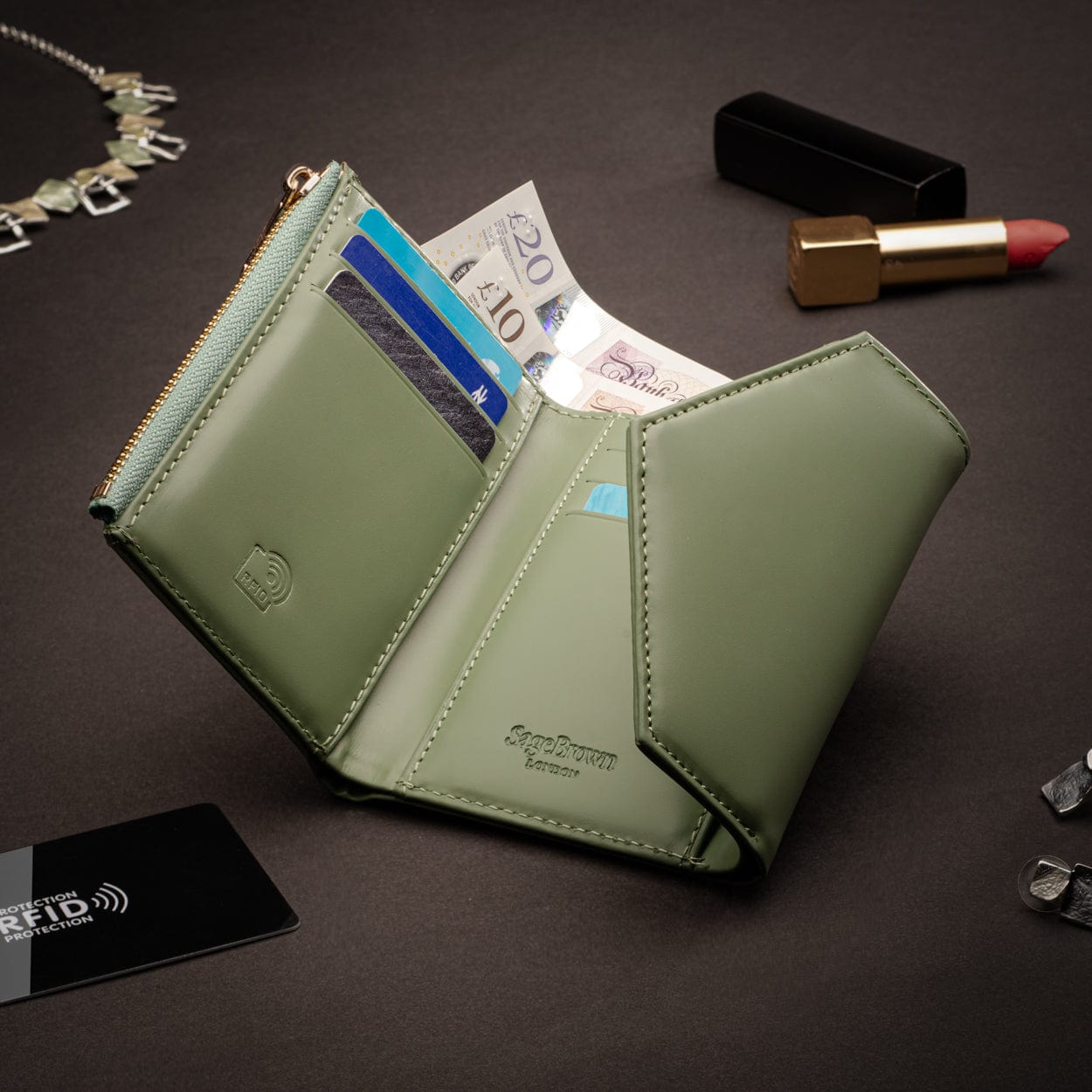 RFID blocking leather envelope purse, sage green, lifestyle