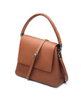 Leather handbag with flap over lid, tan, side view