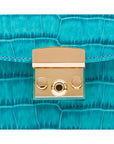 Small leather top handle bag, turquoise croc, lock close up