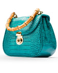 Bamboo handle bag, turquoise croc, side view