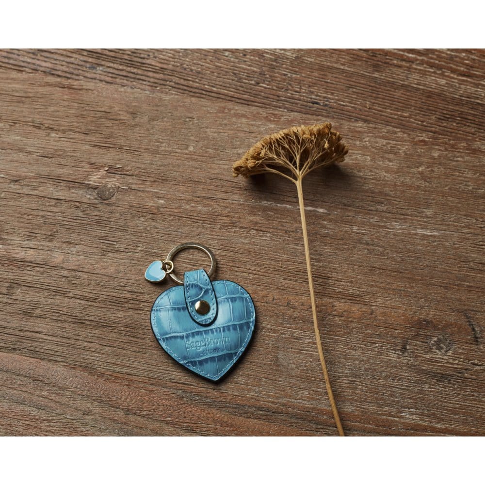 Leather heart shaped key ring, turquoise croc, lifestyle