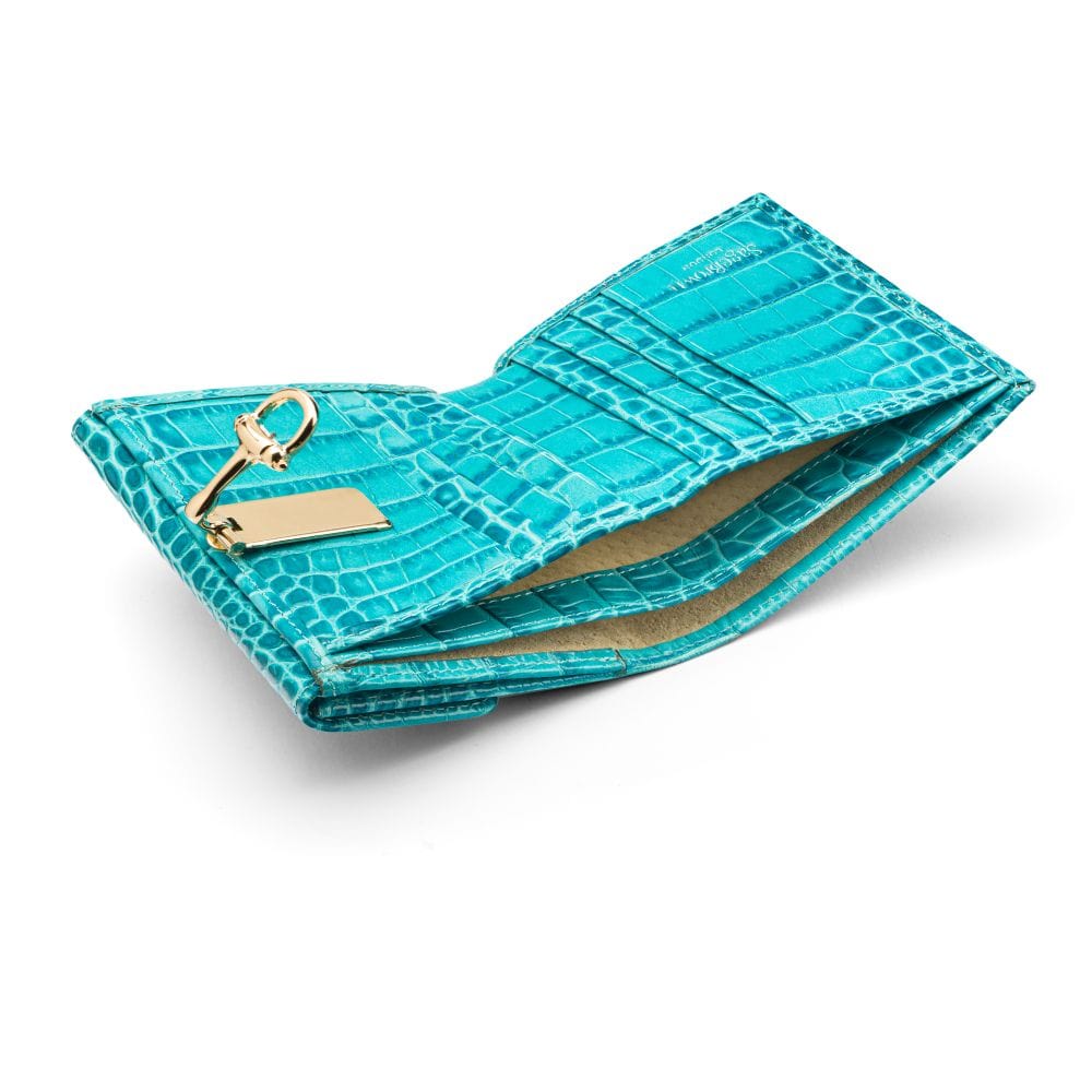 Leather purse with brass clasp, turquoise croc,, inside