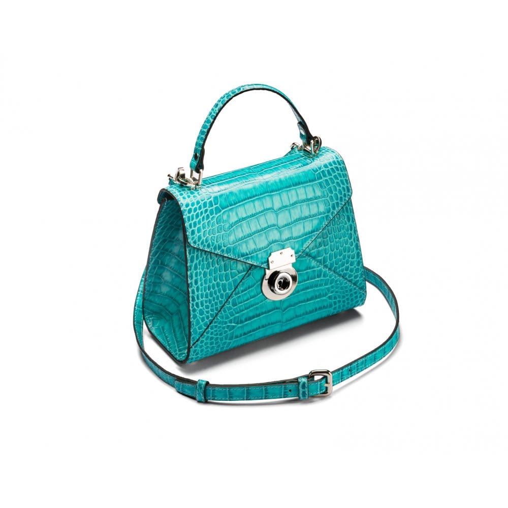 Mini Burnett small top handle bag, turquoise croc, side view