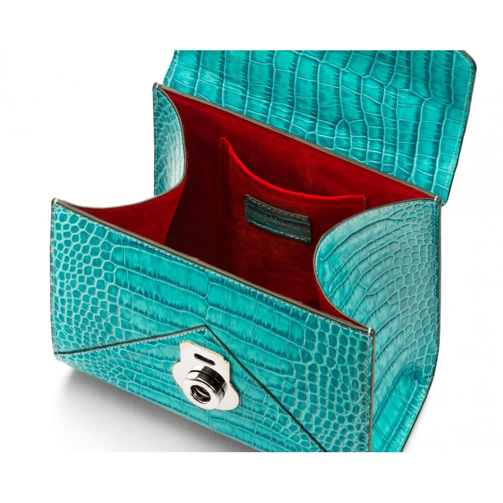 Mini Burnett small top handle bag, turquoise croc, inside view