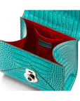 Mini Burnett small top handle bag, turquoise croc, inside view