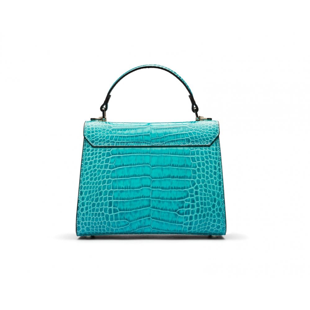 Mini Burnett small top handle bag, turquoise croc, back view