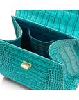 Mini leather Morgan Bag, top handle bag, turquoise croc, inside view