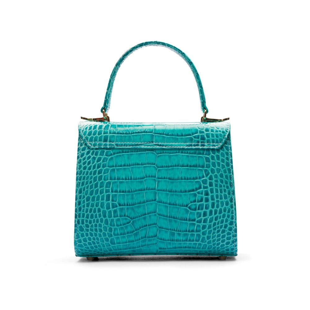 Mini leather Morgan Bag, top handle bag, turquoise croc, back view