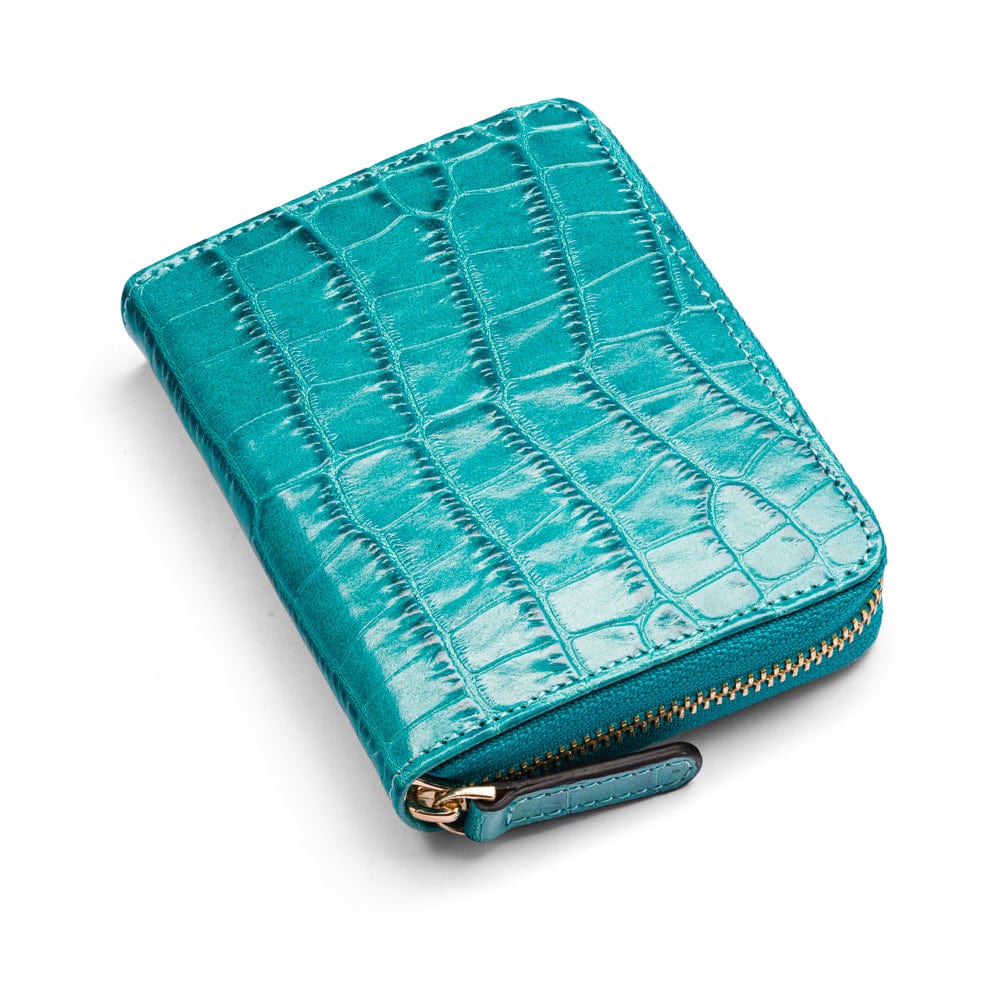 Small leather zip around accordion coin purse, turquoise croc, front view