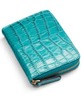 Small leather zip around accordion coin purse, turquoise croc, front view