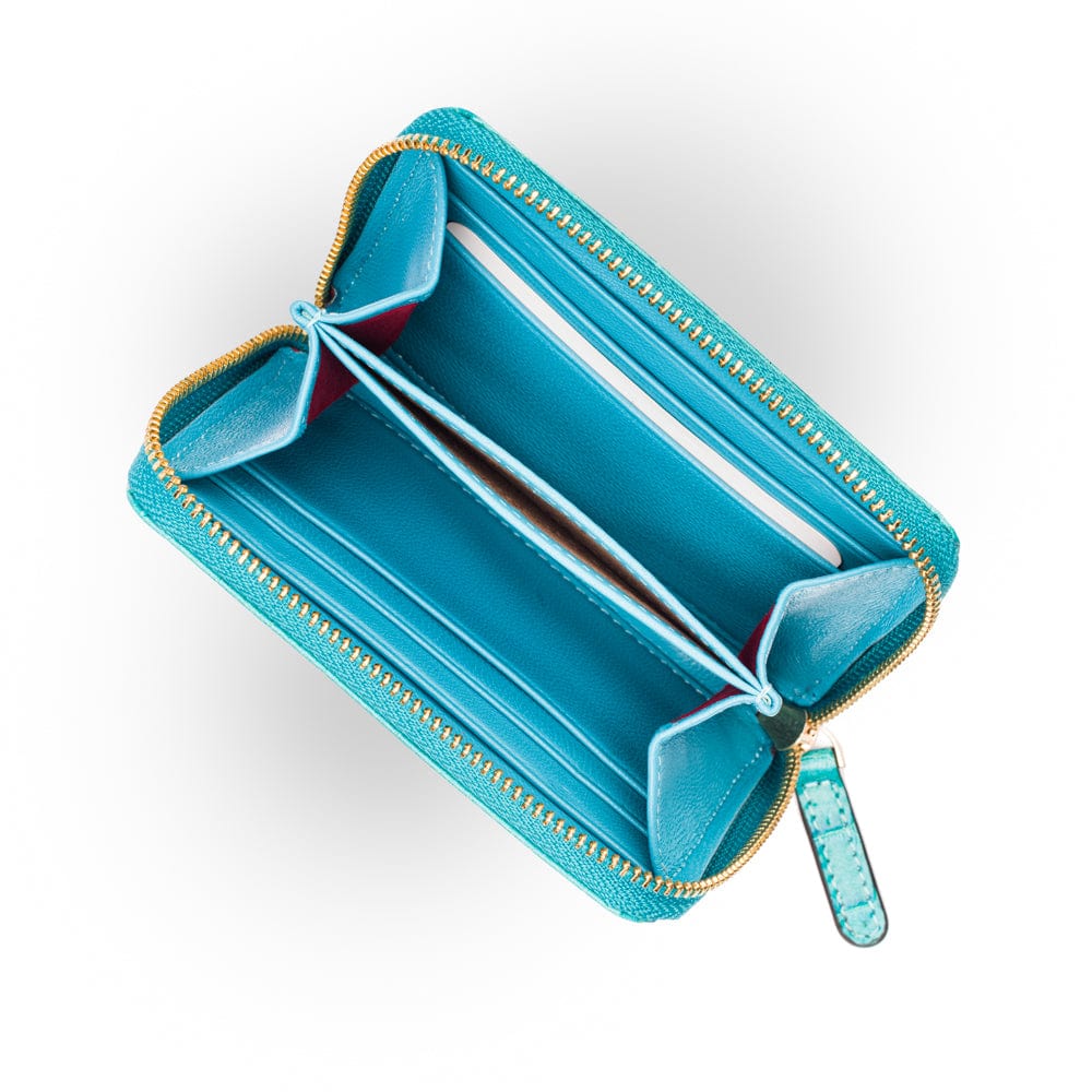 Small leather zip around accordion coin purse, turquoise croc, open view