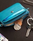 Small leather zip coin purse, turquoise, lifestyle