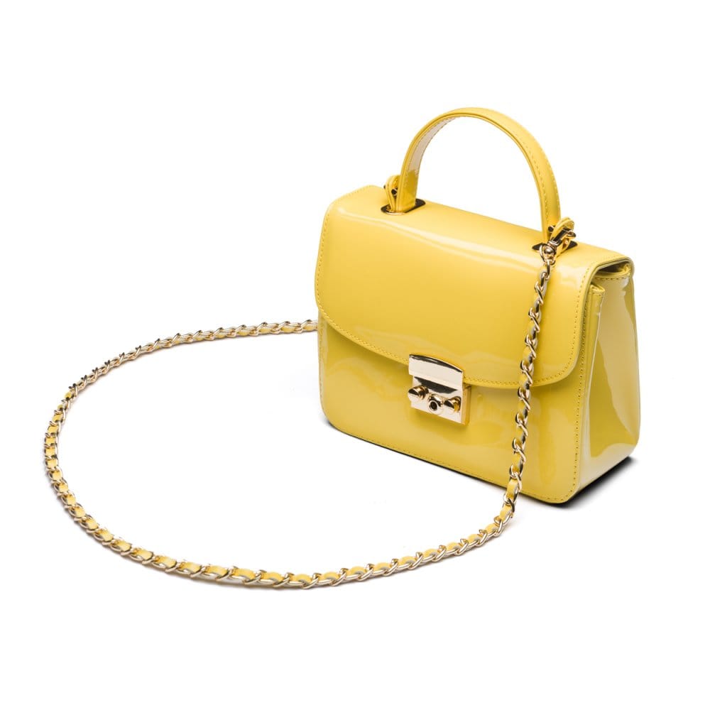 Small leather top handle bag, yellow patent