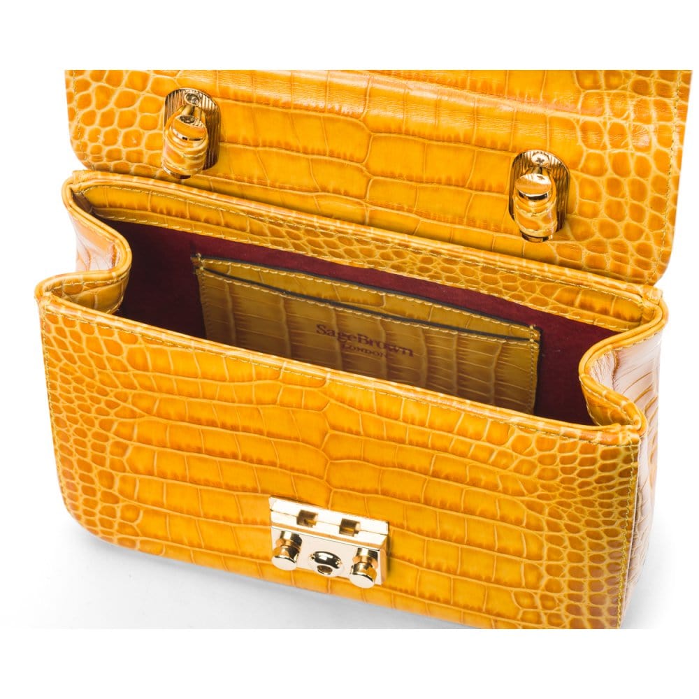 Small leather top handle bag, yellow croc,, inside