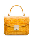 Small leather top handle bag, yellow croc,, front