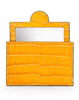 Compact leather mirror, yellow croc, front