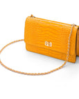 Leather chain bag, yellow croc, side view