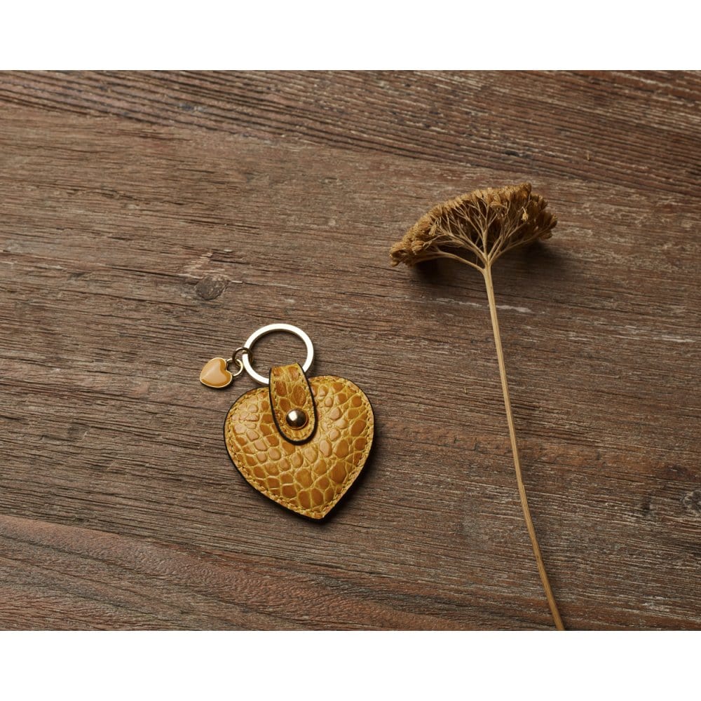 Leather heart shaped key ring, yellow croc, lifestyle