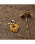 Leather heart shaped key ring, yellow croc, lifestyle