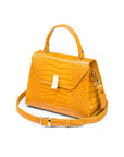 Leather top handle bag, yellow croc, side