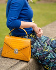 Leather top handle bag, Burnett bag, yellow croc, lifestyle