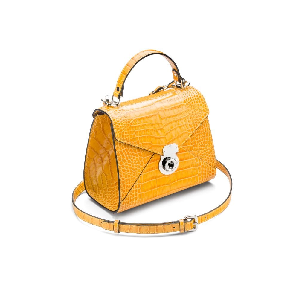 Mini Burnett small top handle bag, yellow croc, side view