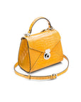 Mini Burnett small top handle bag, yellow croc, side view