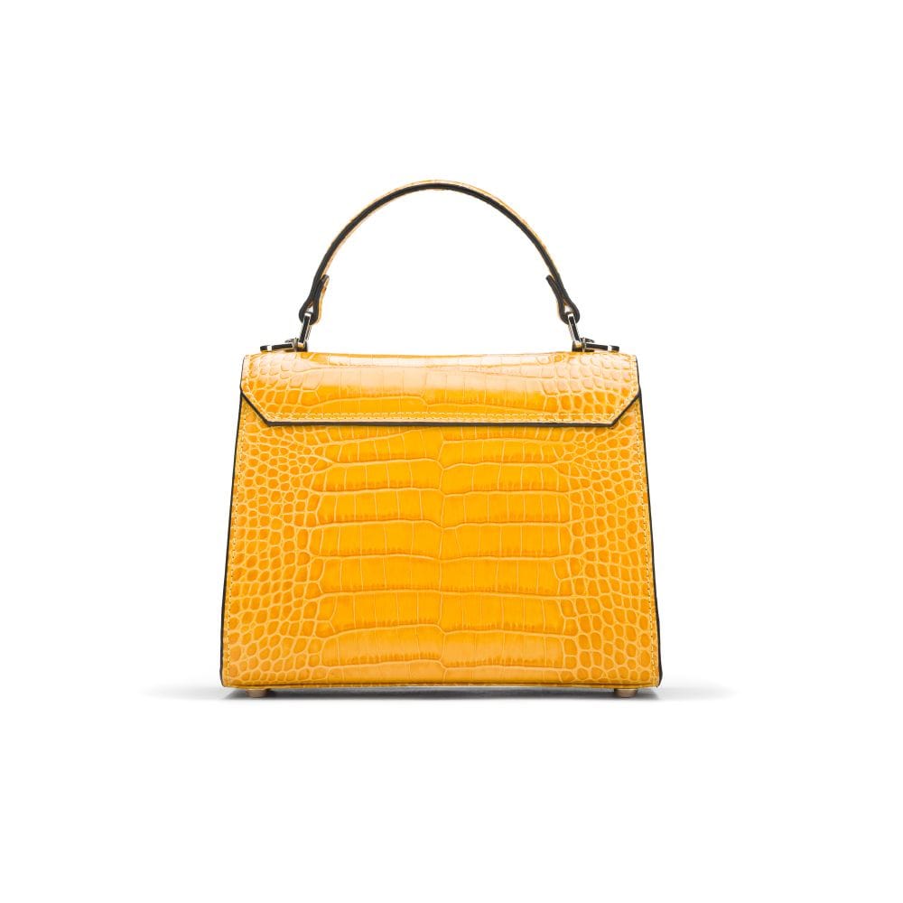 Mini Burnett small top handle bag, yellow croc, back view