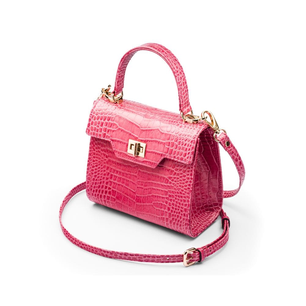 Mini leather Morgan Bag, top handle bag, pink croc, side view