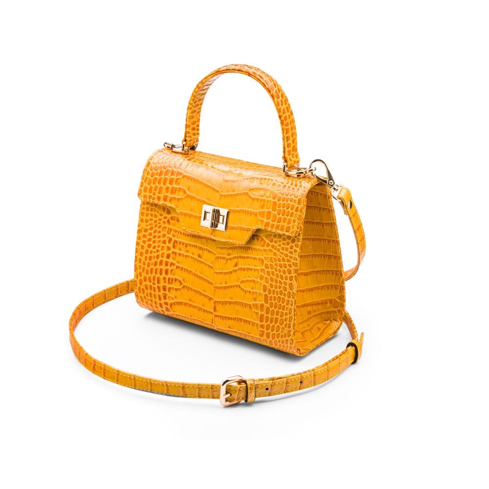 Mini leather Morgan Bag, top handle bag, yellow croc, side view