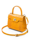 Mini leather Morgan Bag, top handle bag, yellow croc, side view