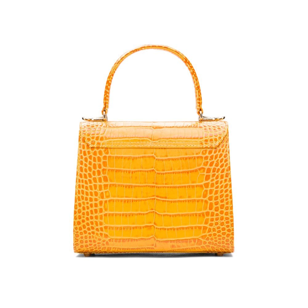 Mini leather Morgan Bag, top handle bag, yellow croc, back view
