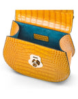 Leather rounded bottom top handle bag, yellow croc, inside