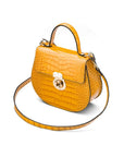 Leather rounded bottom top handle bag, yellow croc, side