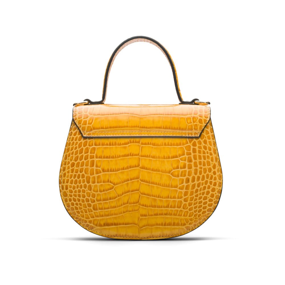 Leather rounded bottom top handle bag, yellow croc, back