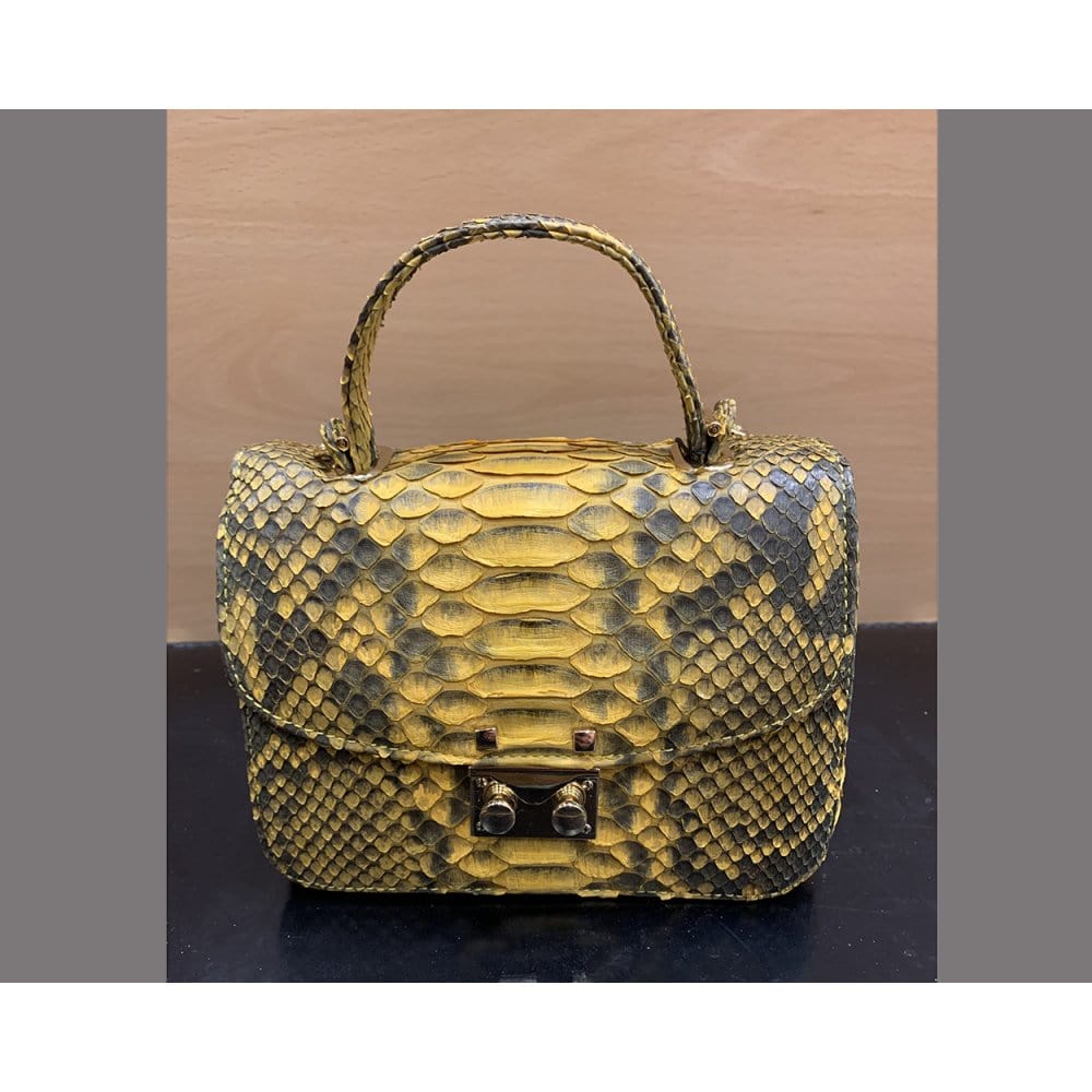 Small real python top handle bag, yellow, front