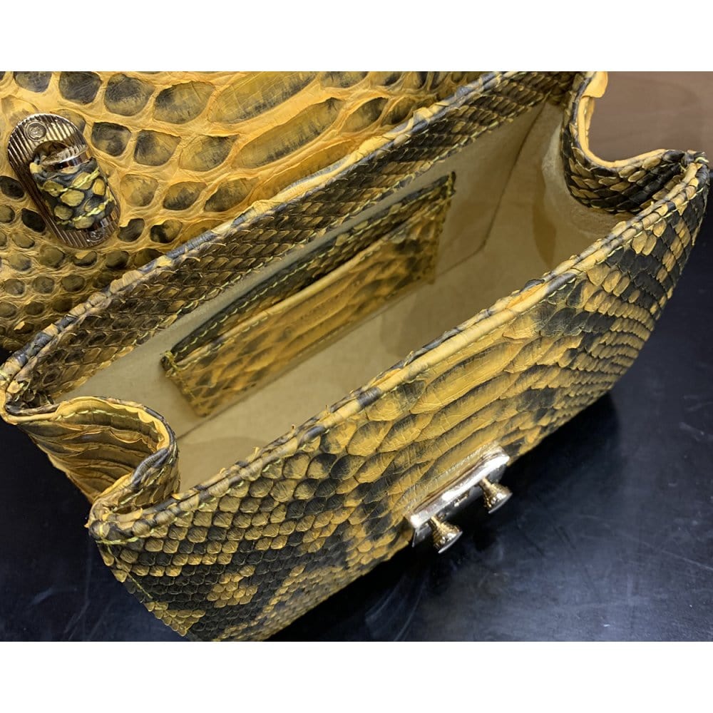 Small real python top handle bag, yellow, inside