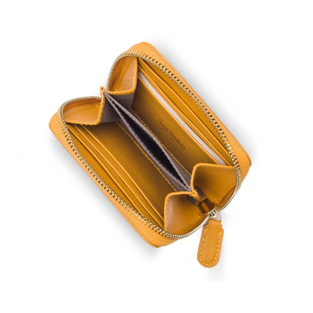 Small zip around woven leather accordion purse, yellow, interior